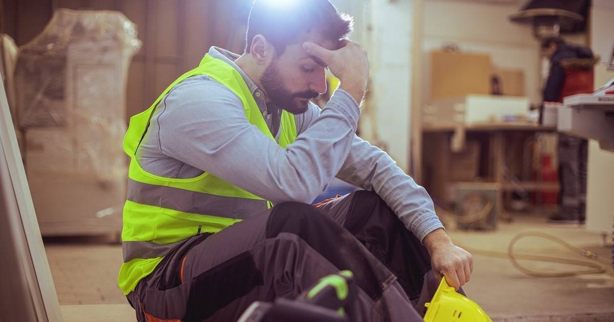 tired construction worker from labor shortage